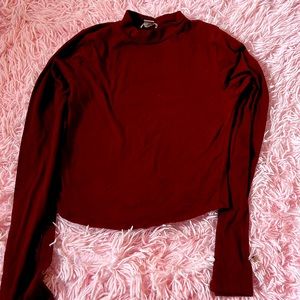 Long sleeved maroon shirt